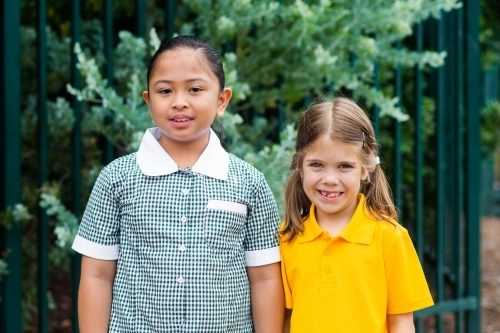 happy primary school children outside - Australian Stock Image