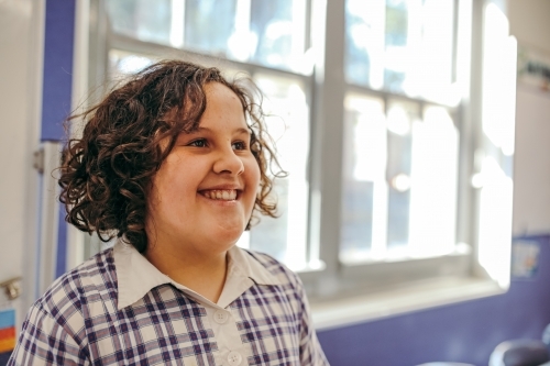 Happy primary school student - Australian Stock Image