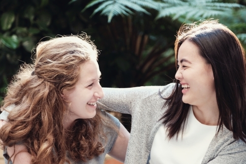 Happy students girl friends - Australian Stock Image