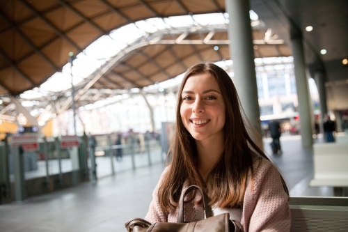 Happy Train Traveler at the Station - Australian Stock Image
