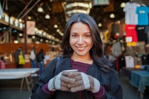 Happy woman at Queen Victoria Market - Australian Stock Image