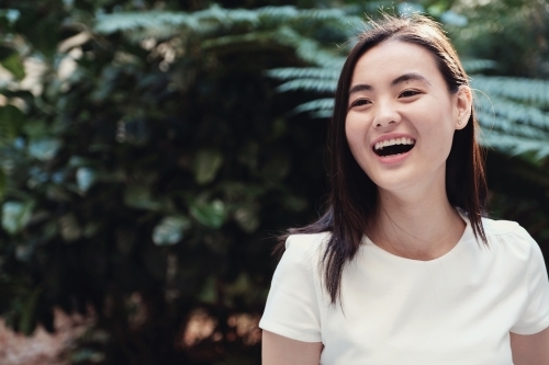 Happy young adult Asian student - Australian Stock Image
