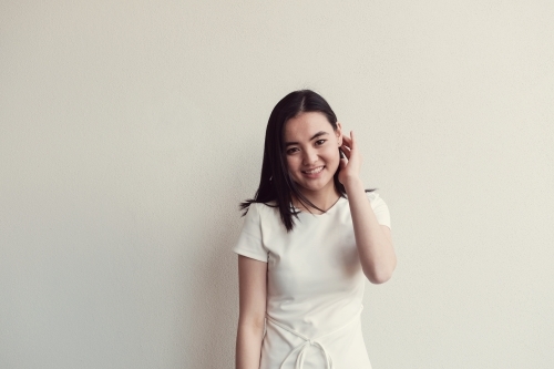 Happy young adult Asian student - Australian Stock Image