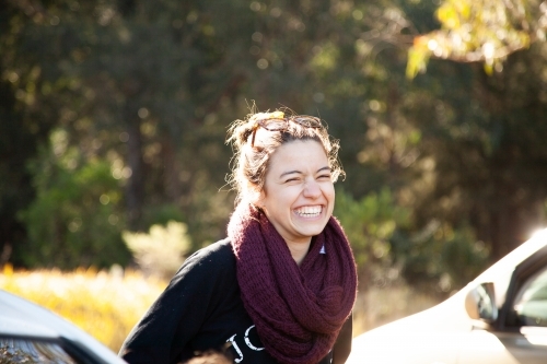Happy young woman laughing - Australian Stock Image
