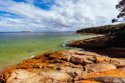 Hazards Beach during a warm spring day on the west side of the Freycinet Peninsula - Australian Stock Image