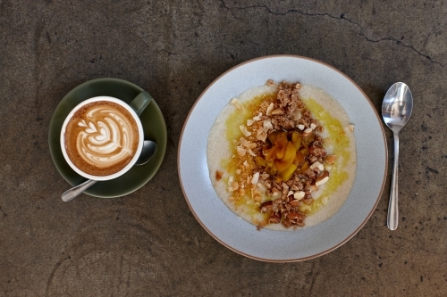 Healthy porridge and coffee for breakfast - Australian Stock Image