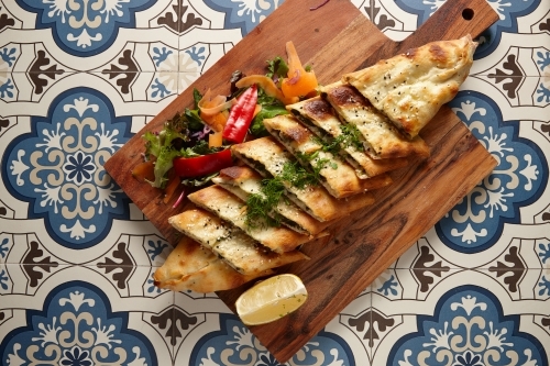 Healthy Turkish bread dish on table - Australian Stock Image