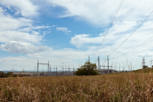 High voltage power lines leading to power station on the outskirts of Tamworth NSW - Australian Stock Image