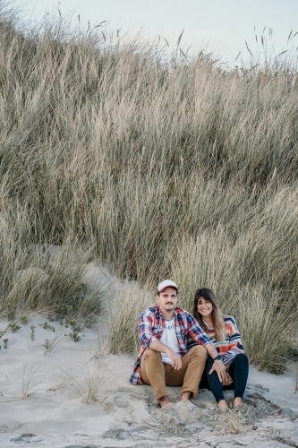 Hip young couple at the beach. - Australian Stock Image