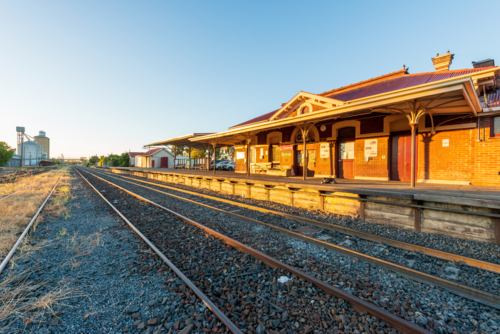 Historic rural railway station at Dimboola in warm early morning light. - Australian Stock Image