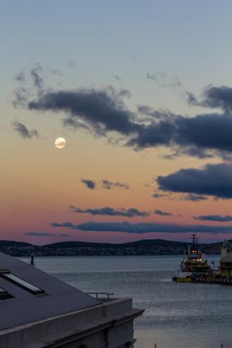 Hobart Wharf Sunset and Moonrise - Australian Stock Image