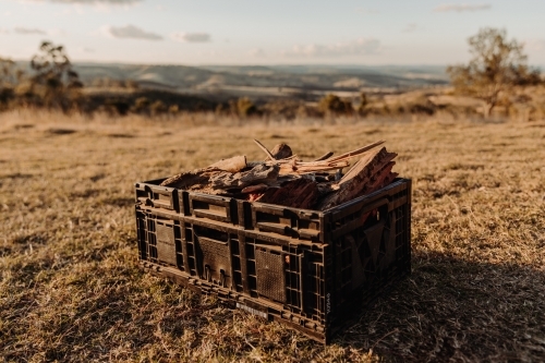 Horizontal shot of a crate full of pieces of wood