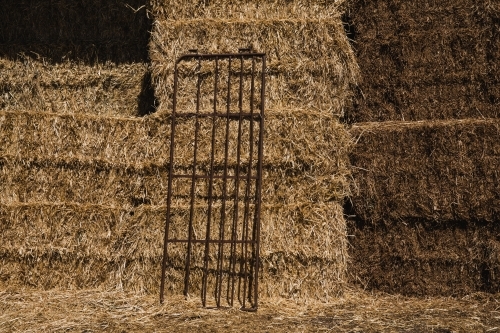 Horizontal shot of a Hay Bales stored in a shed on rural property