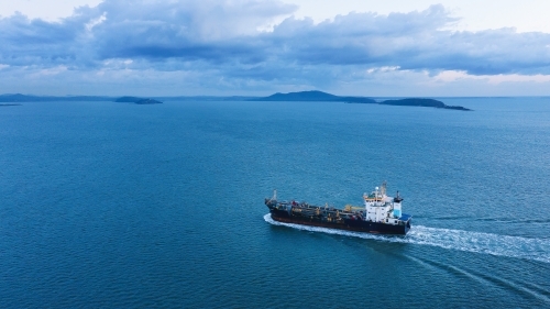 Horizontal shot of a ship travelling from right to left - Australian Stock Image