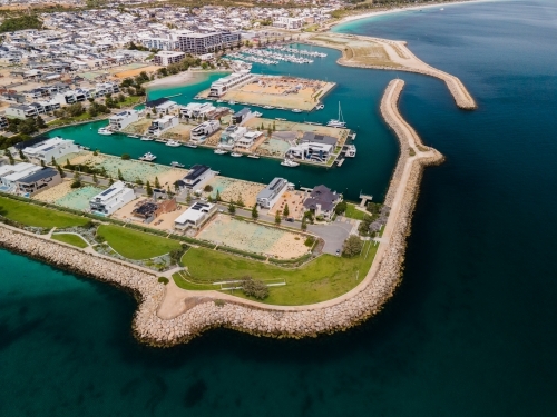 horizontal shot of an island with buildings, roads, trees and cars on a sunny day - Australian Stock Image