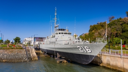Horizontal shot of docked warship at East Shores Gladstone - Australian Stock Image