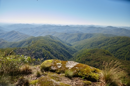 Horizontal shot of mountain tops on a sunny day - Australian Stock Image