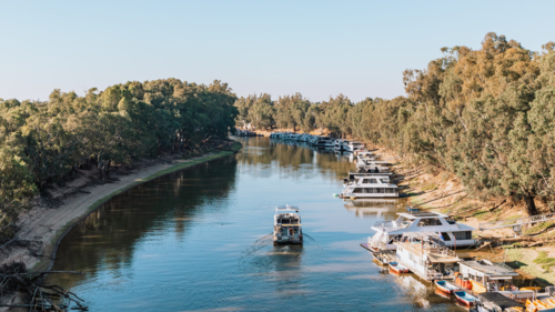 Houseboat cruising Murray River - Australian Stock Image