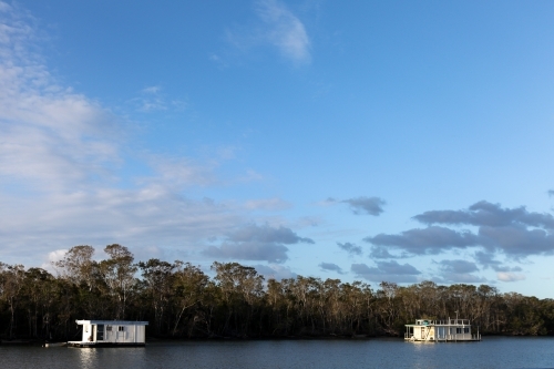 Houseboats on river - Australian Stock Image