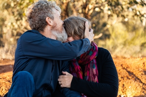 Husband kissing wife - Australian Stock Image