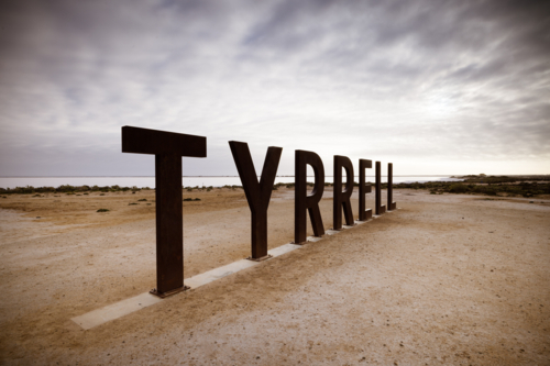 iconic signage at the famous and popular Lake Tyrrell which is a large salt lake at sunset - Australian Stock Image