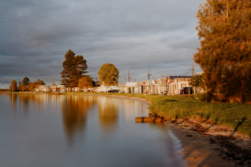 Idyllic Waterfront Shacks on Lake Alexandrina at Milang, South Australia - Australian Stock Image