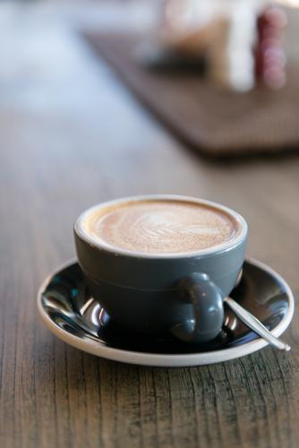 Image of a coffee on a wooden table