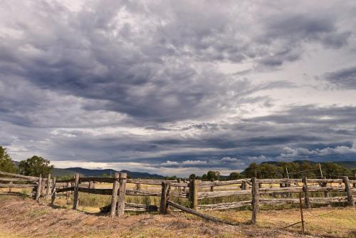 Incoming storm over farmland. - Australian Stock Image