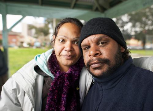 Indigenous Australian Man and Woman in a Shelter - Australian Stock Image