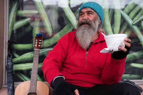 Indigenous Australian Man Having a Break from Busking