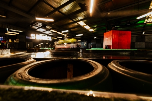 Indoor Go Kart race track with motion blur - Australian Stock Image