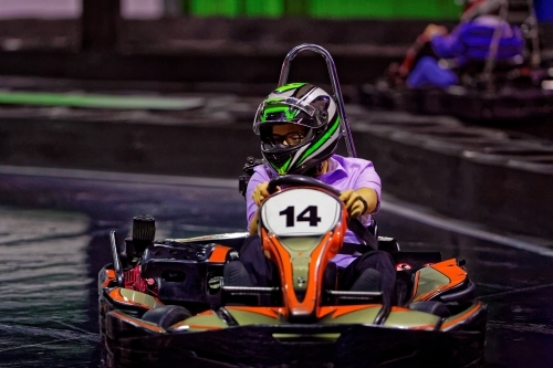 Indoor Go Kart Racing circuit arcade family fun go karting - Australian Stock Image