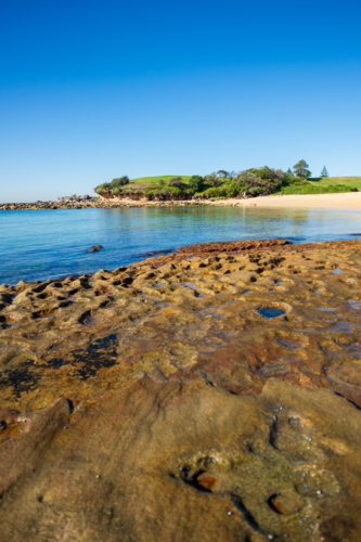 interesting rock formation at Little Bay beach - Australian Stock Image