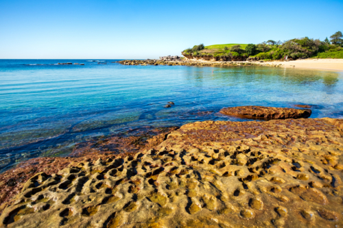 interesting rock formation at Little Bay beach - Australian Stock Image