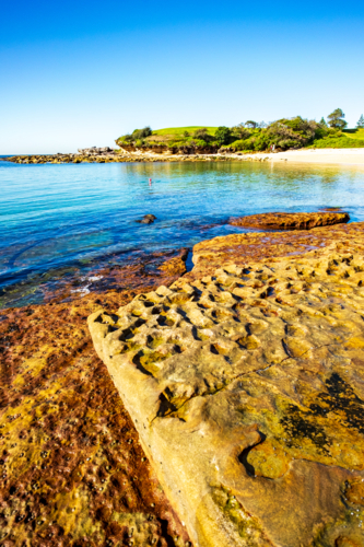 interesting rock formation at Little Bay beach - Australian Stock Image