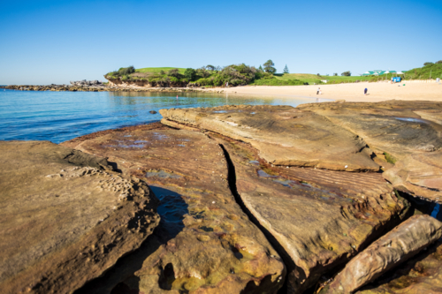 interesting rock formation at Little Bay beach - Australian Stock Image
