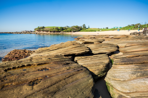 interesting rock formation at Little Bay beach - Australian Stock Image