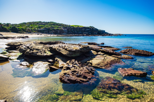 interesting rock formation at Little Bay beach - Australian Stock Image