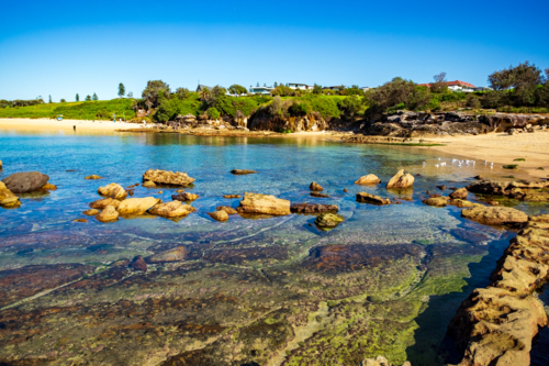 interesting rock formation at Little Bay beach - Australian Stock Image