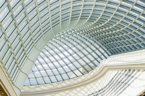Interior view of a curved ceiling of glass windows