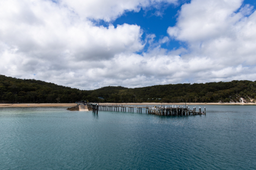 jetty and barge landing at K'gari near Kingfisher Bay - Australian Stock Image