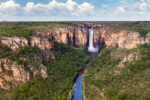 Jim Jim Falls flowing in the wet season, Kakadu National Park - Australian Stock Image