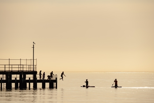 Jumping off pier - Australian Stock Image