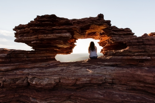 Kalbarri's Nature's Window with girl viewing the gorges at sunrise