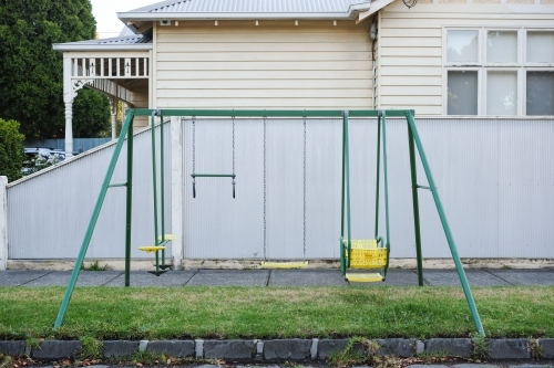 Kids play equipment setup on a nature strip - Australian Stock Image