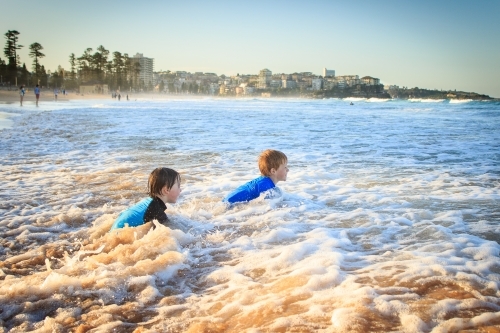 Kids swimming at the beach, Manly, Sydney, Australia