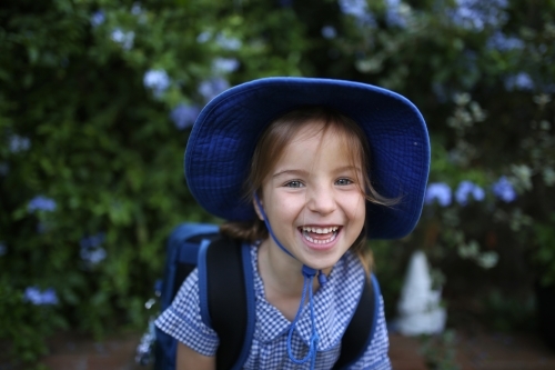 Kindergarten girl smiling in school uniform - Australian Stock Image