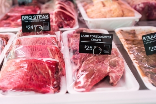 labels on meat in butcher shop - Australian Stock Image