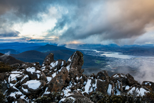 mountain landscape with rocks and snow - Australian Stock Image