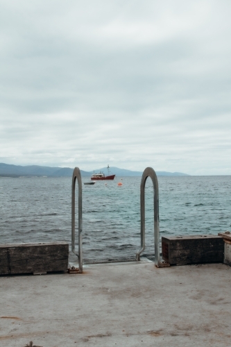Ladder into ocean - Australian Stock Image